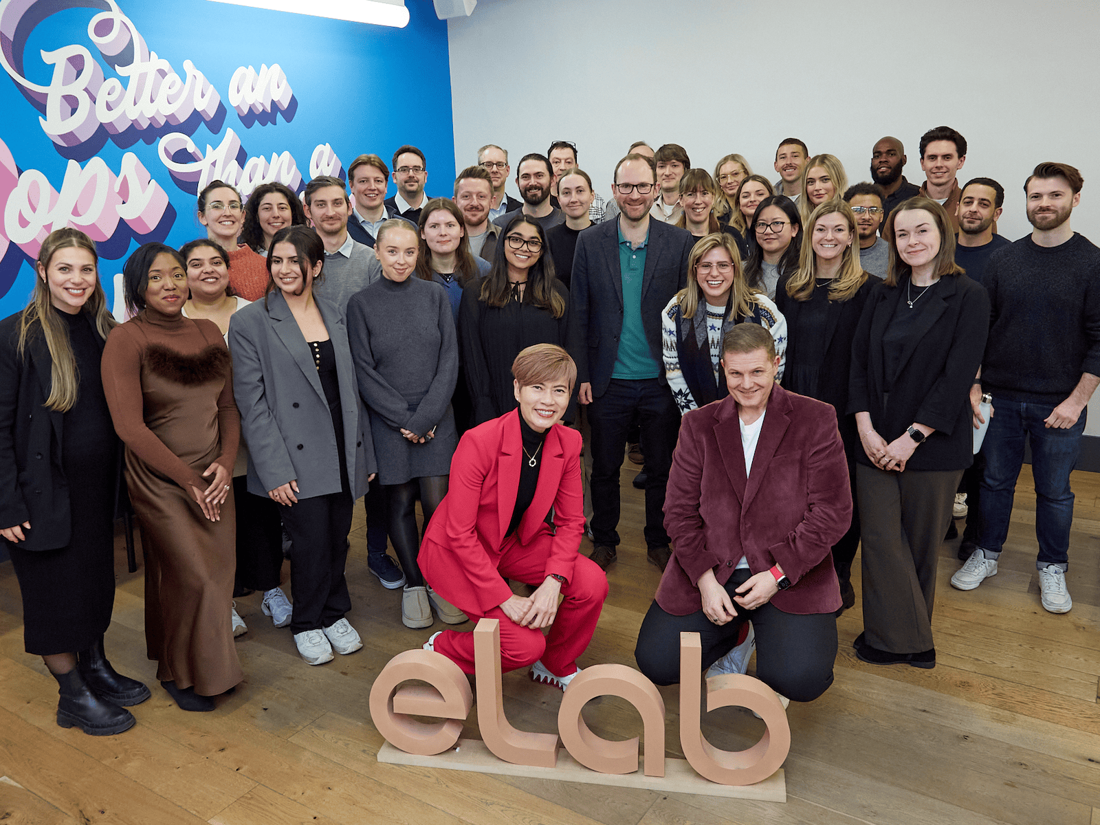 Group of people posing with "elab" letters.