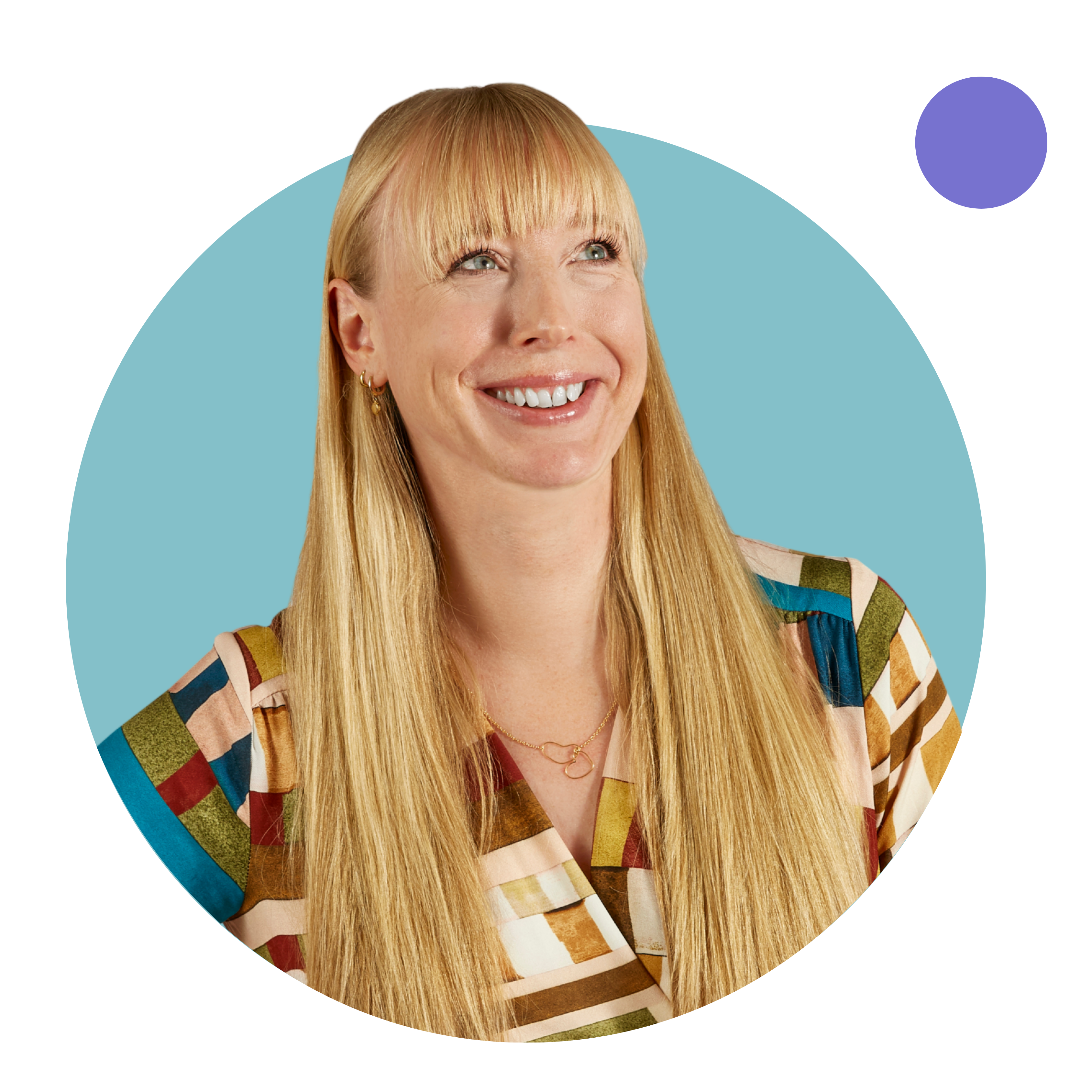 Woman with long blonde hair smiles, looking upwards.