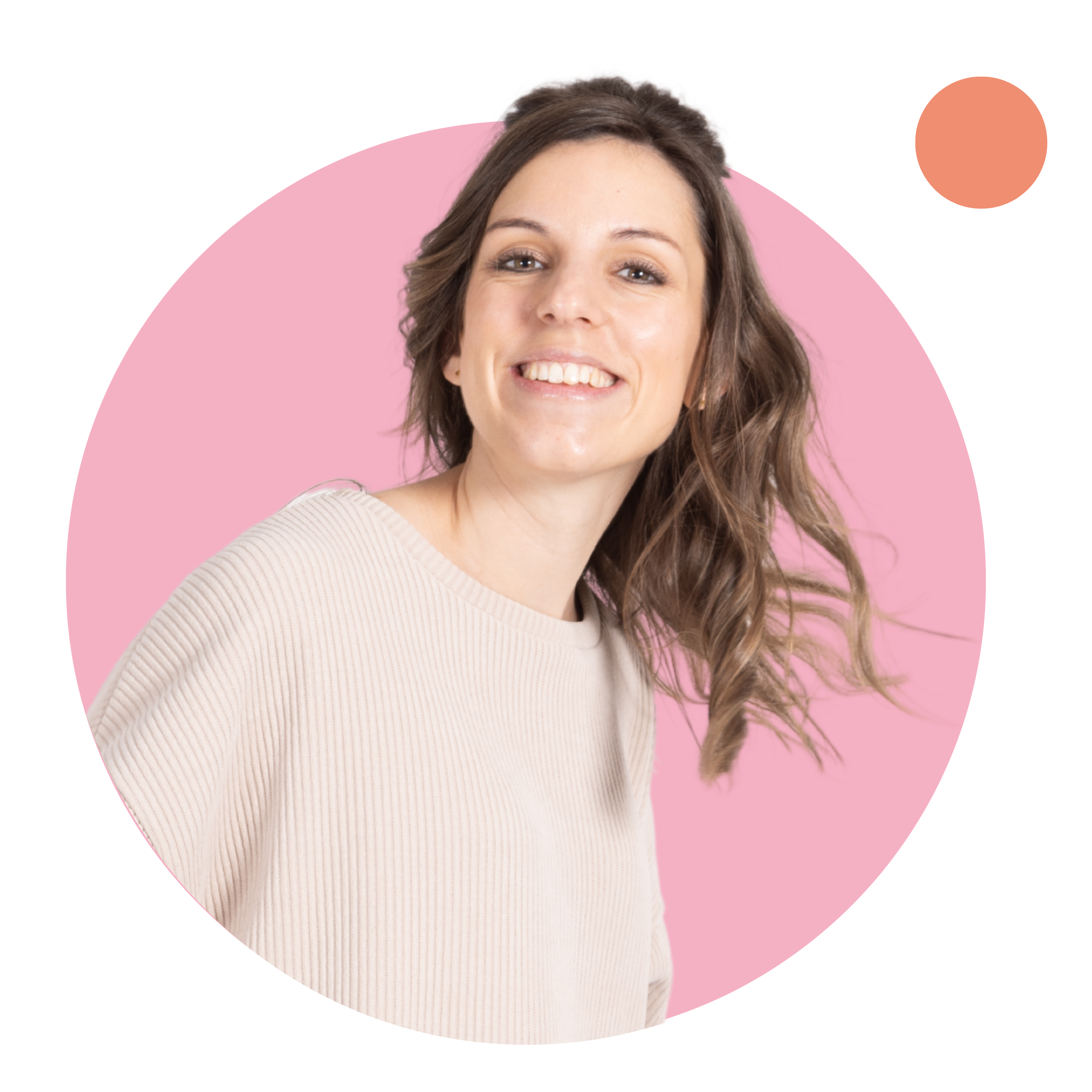 Woman smiling, wearing a beige sweater, pink background.